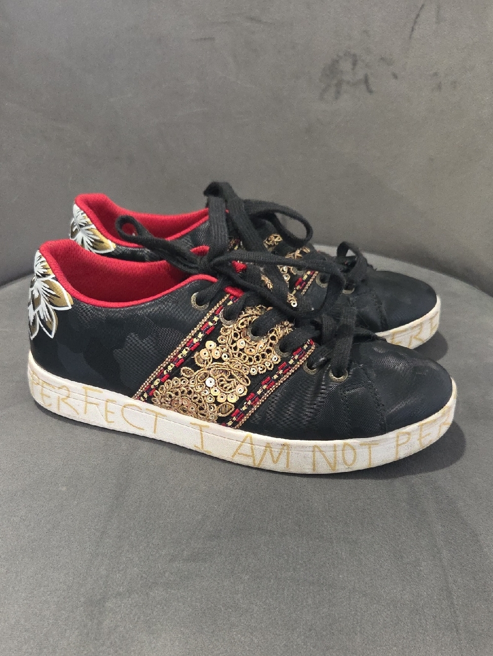 Desigual Black Sneakers with Red Lining and Gold Embellishment
